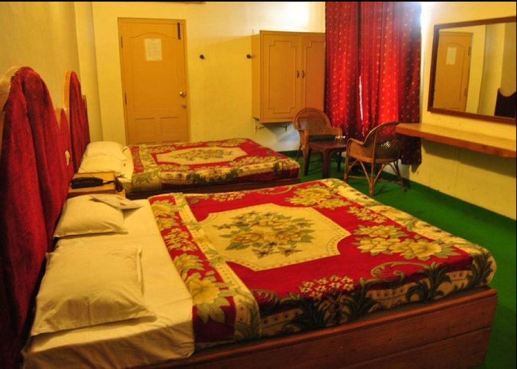 كوديكانال Hotel Ruby International الغرفة الصورة